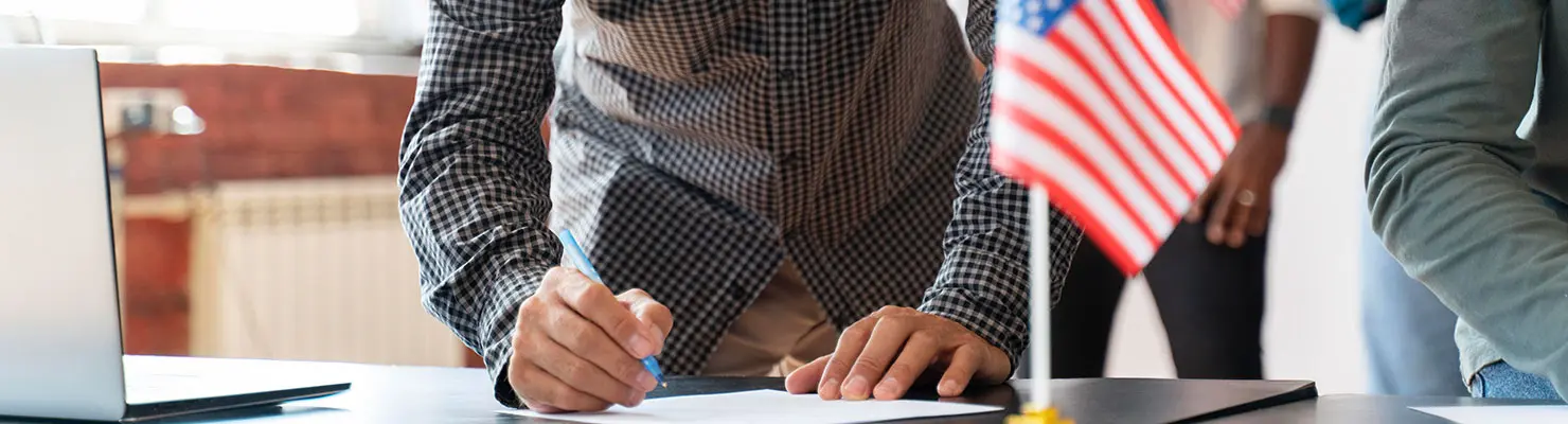 Person reviewing key aspects of the denaturalization process for naturalized citizens Person reviewing key aspects of the denaturalization process for naturalized citizens